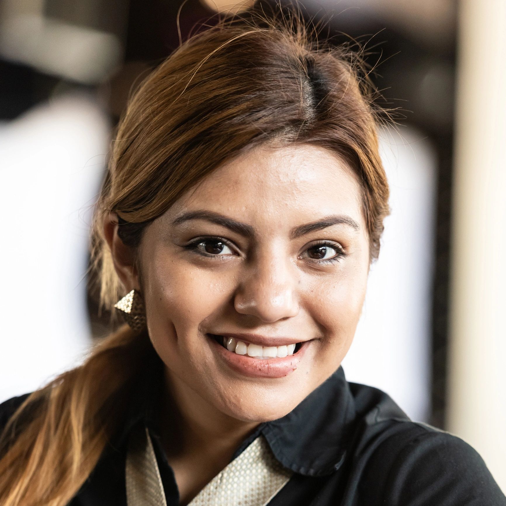 Professional portrait representing global perspective
