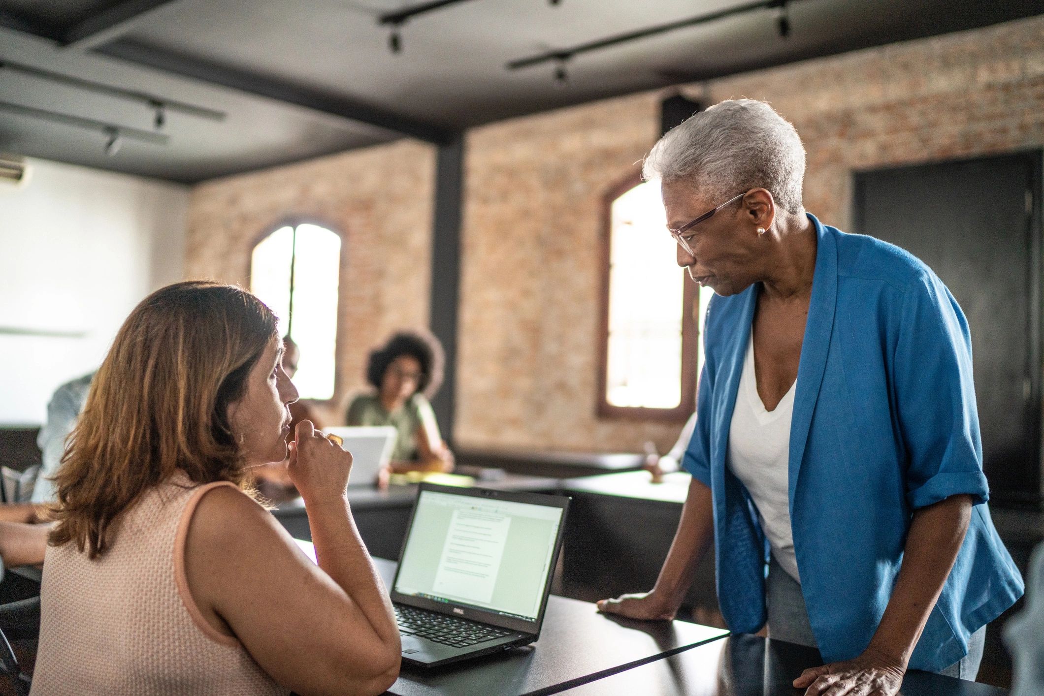Executive coaching session in a classroom setting
