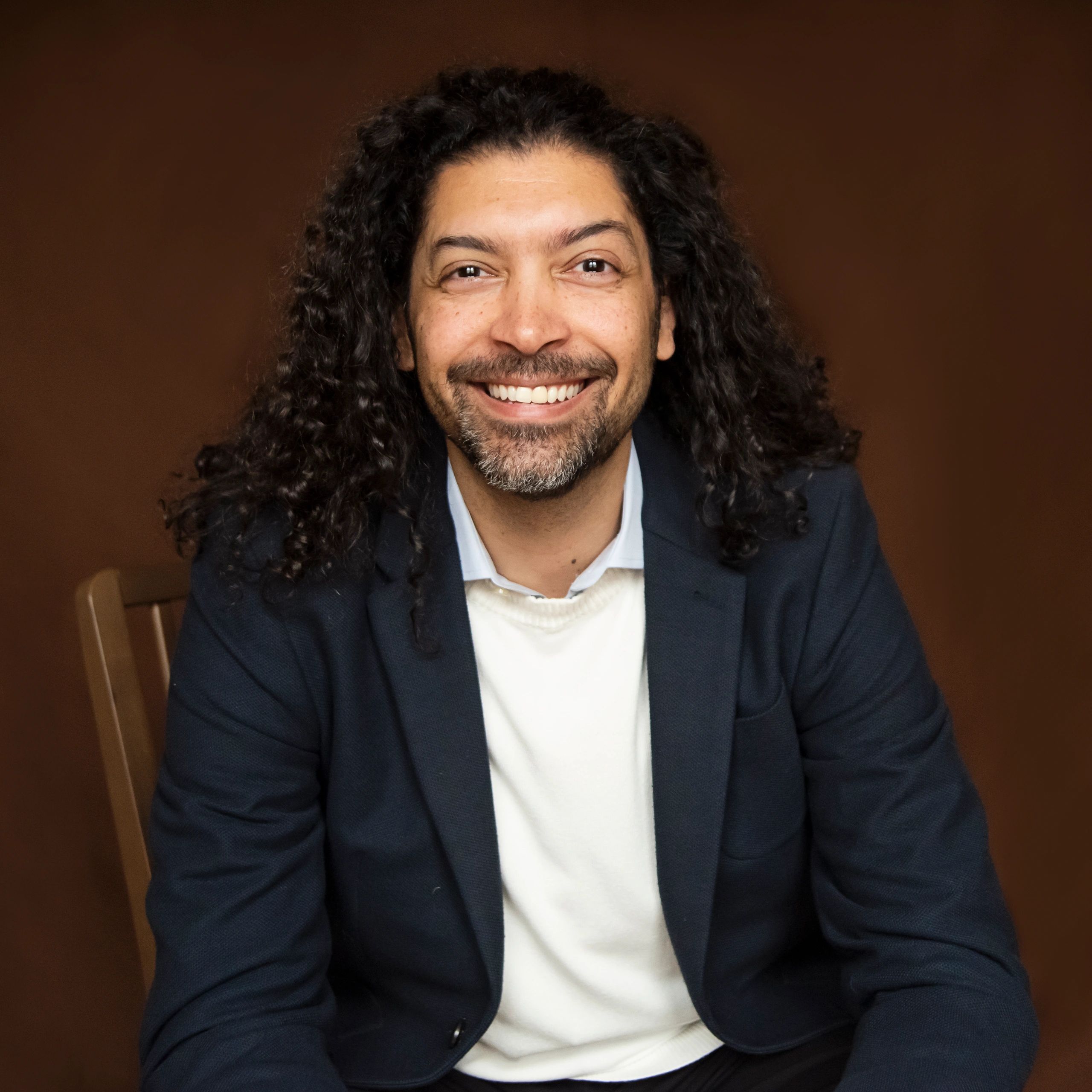 Professional portrait representing practical impact