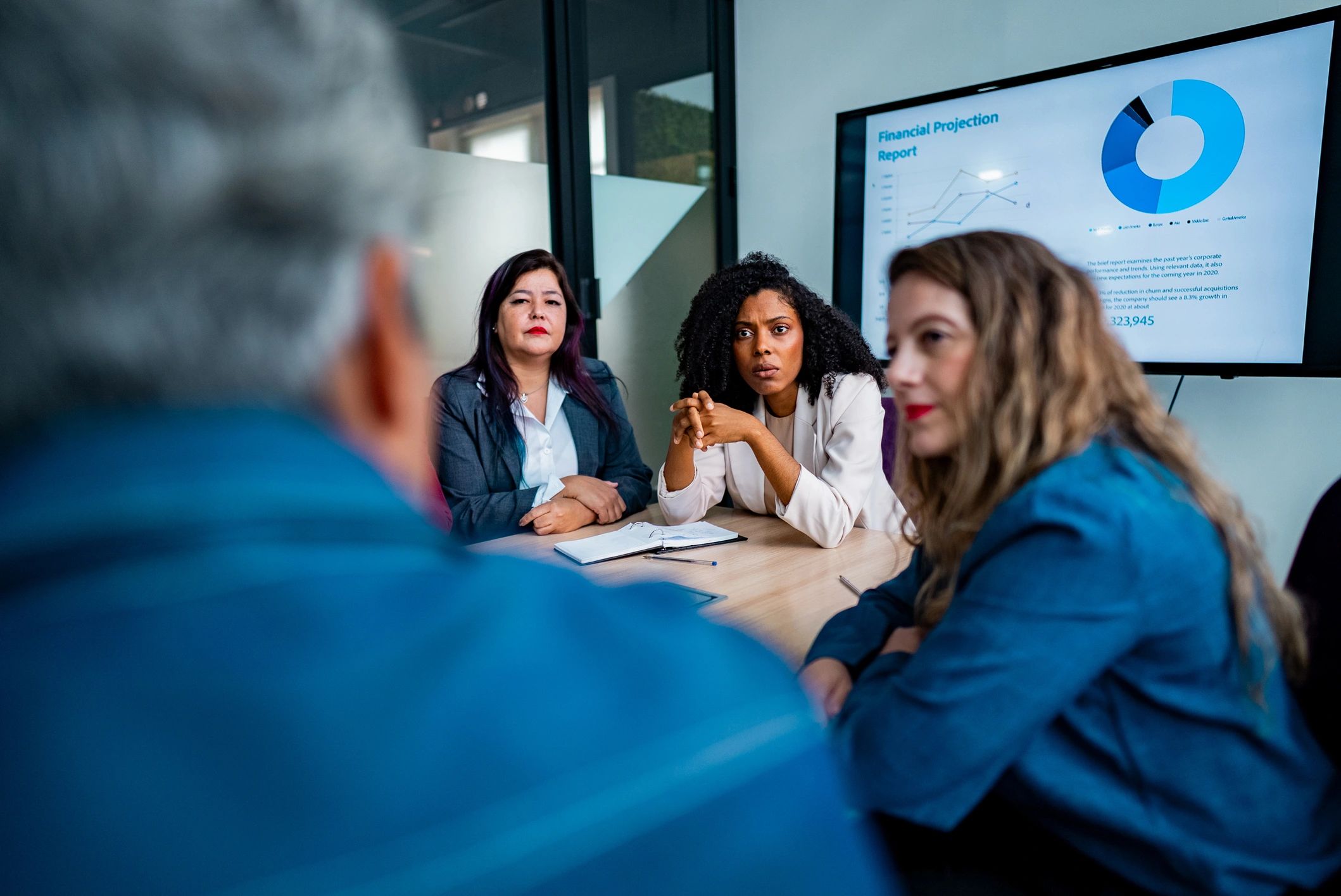 Professionals collaborating in a strategy meeting