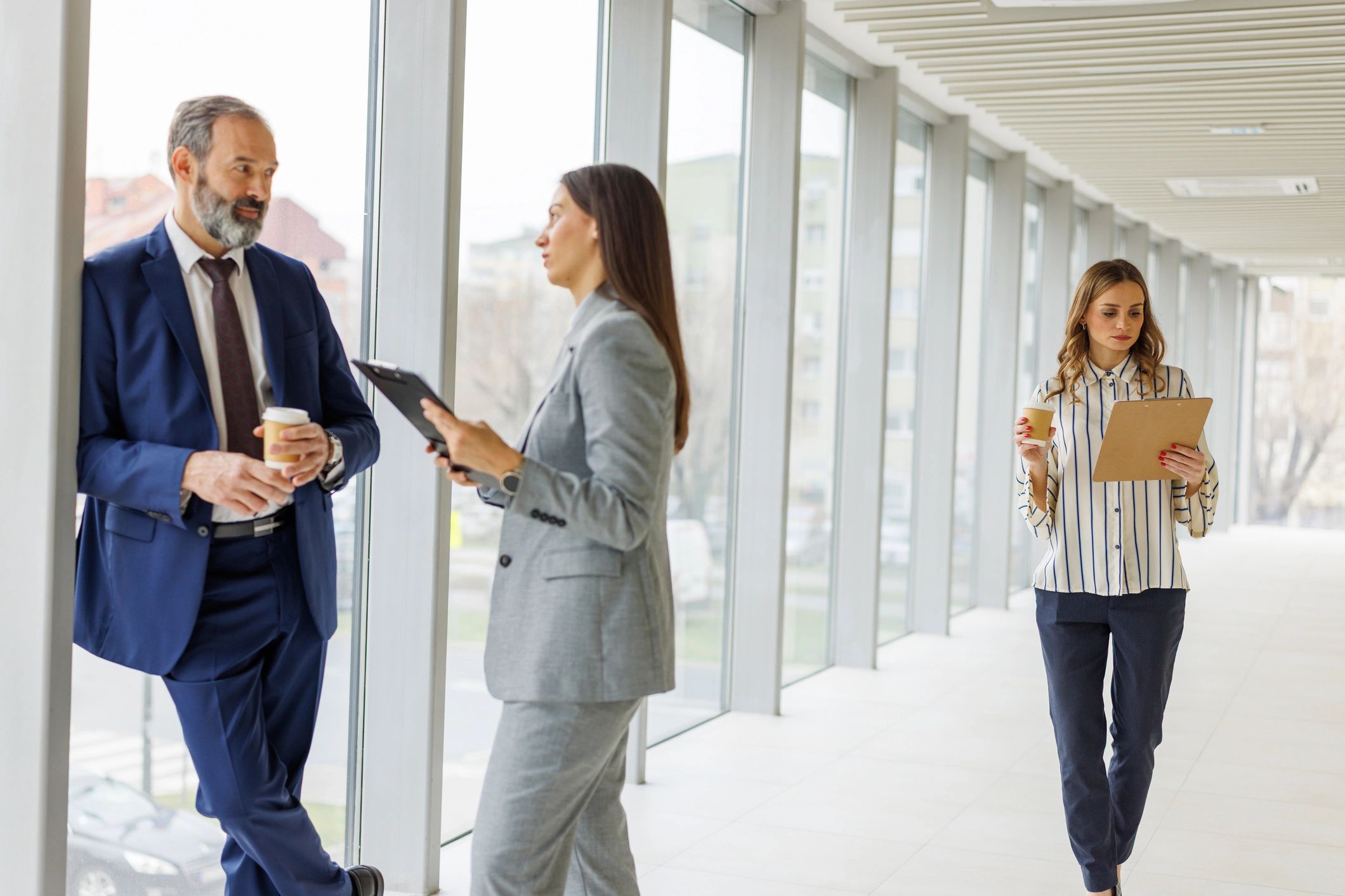 Professionals collaborating in a modern corporate setting